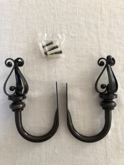 A pair of Curtain holdback