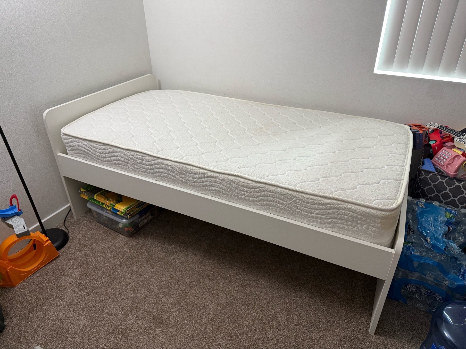 Ikea twin bed and mattress .