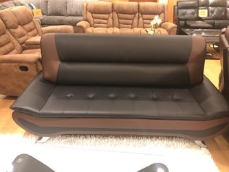 Black and Brown leather Sofa loveseat and matching coffee table set
