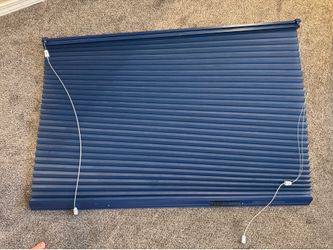 Blue Hunter Douglas accordion blinds