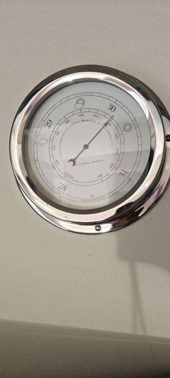 9 inch Hagan Quidnet aneroid barometer featuring a polished