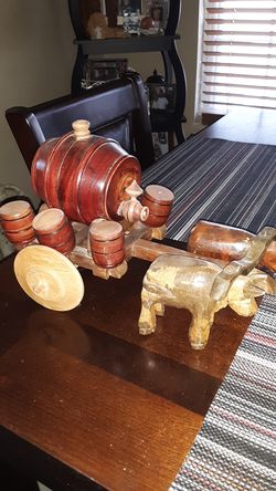 Ox and wagon with leg on top very old