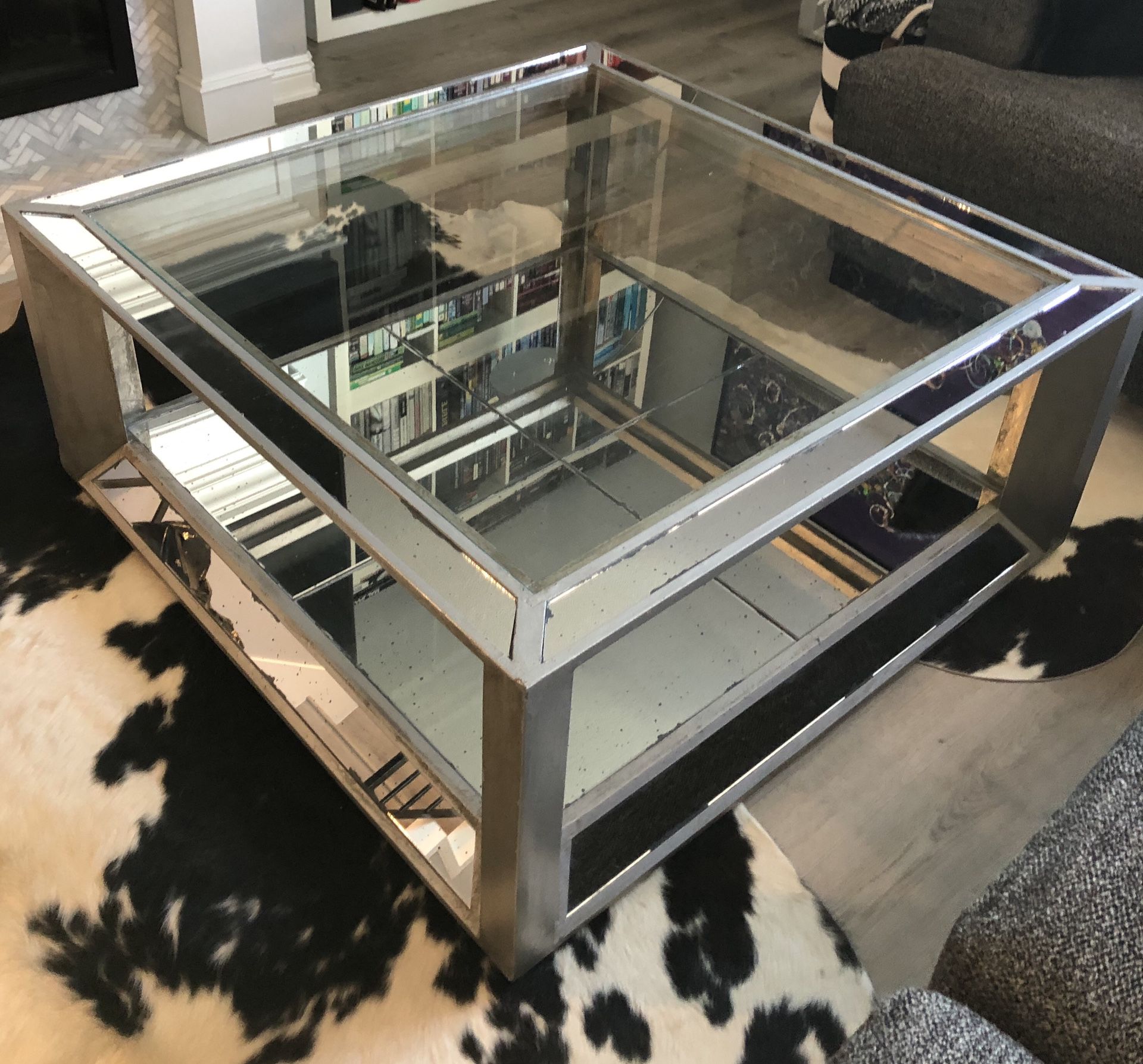 mirrored/glass coffee table and end table.