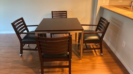 Dining room table four matching chairs