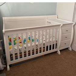 Crib with cushion