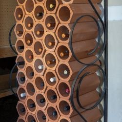 Wine Storage Rack With Individual Clay Bottle Holders