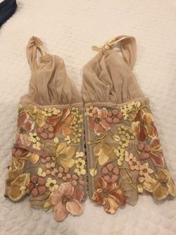 brown and beige floral tank top.