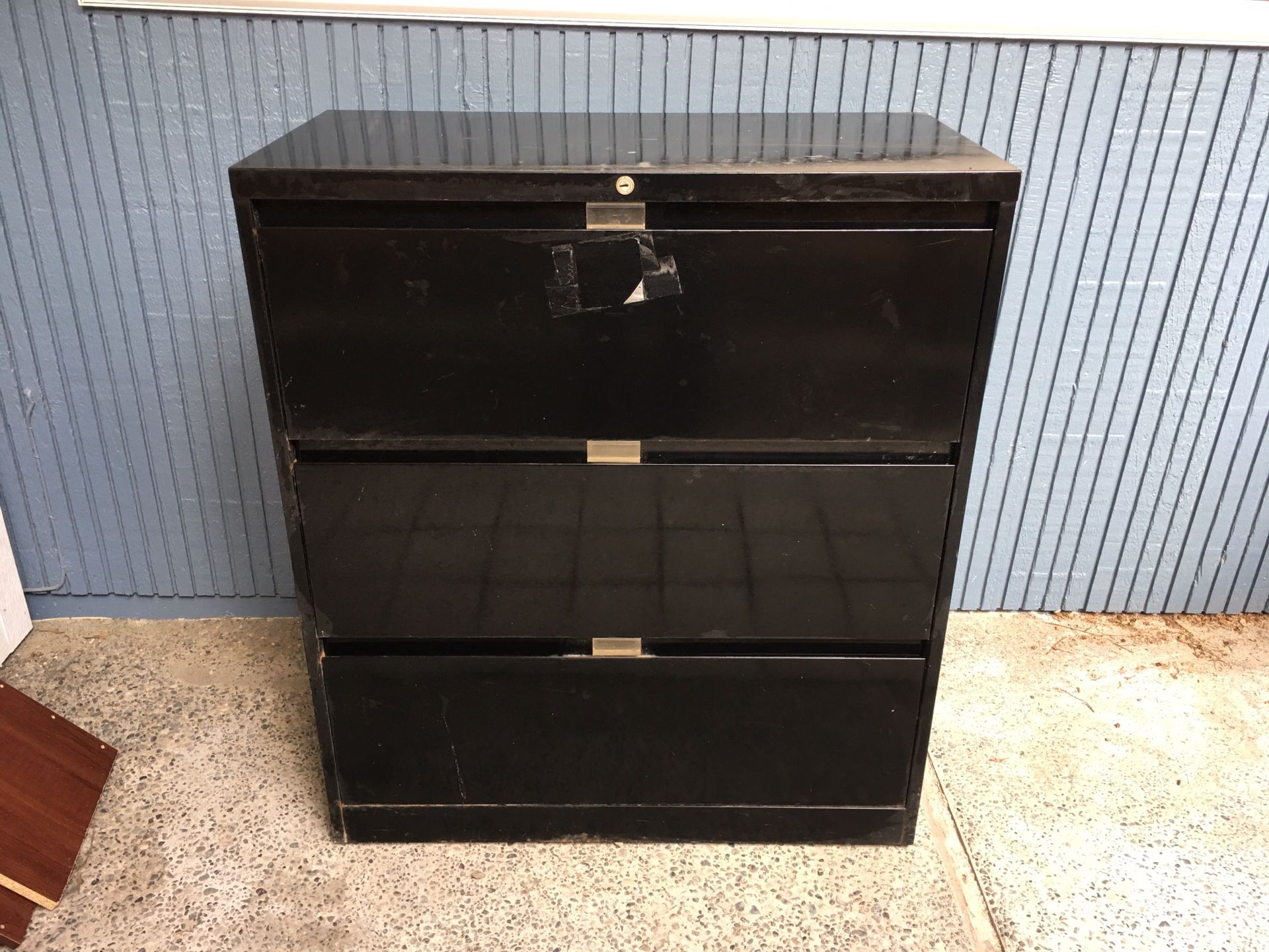Heavy metal file cabinet for sale. Dimensions: 36" w 18" deep 41" h. $50 or best offer