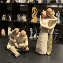 Newborn Baby And Loving Couple Statue