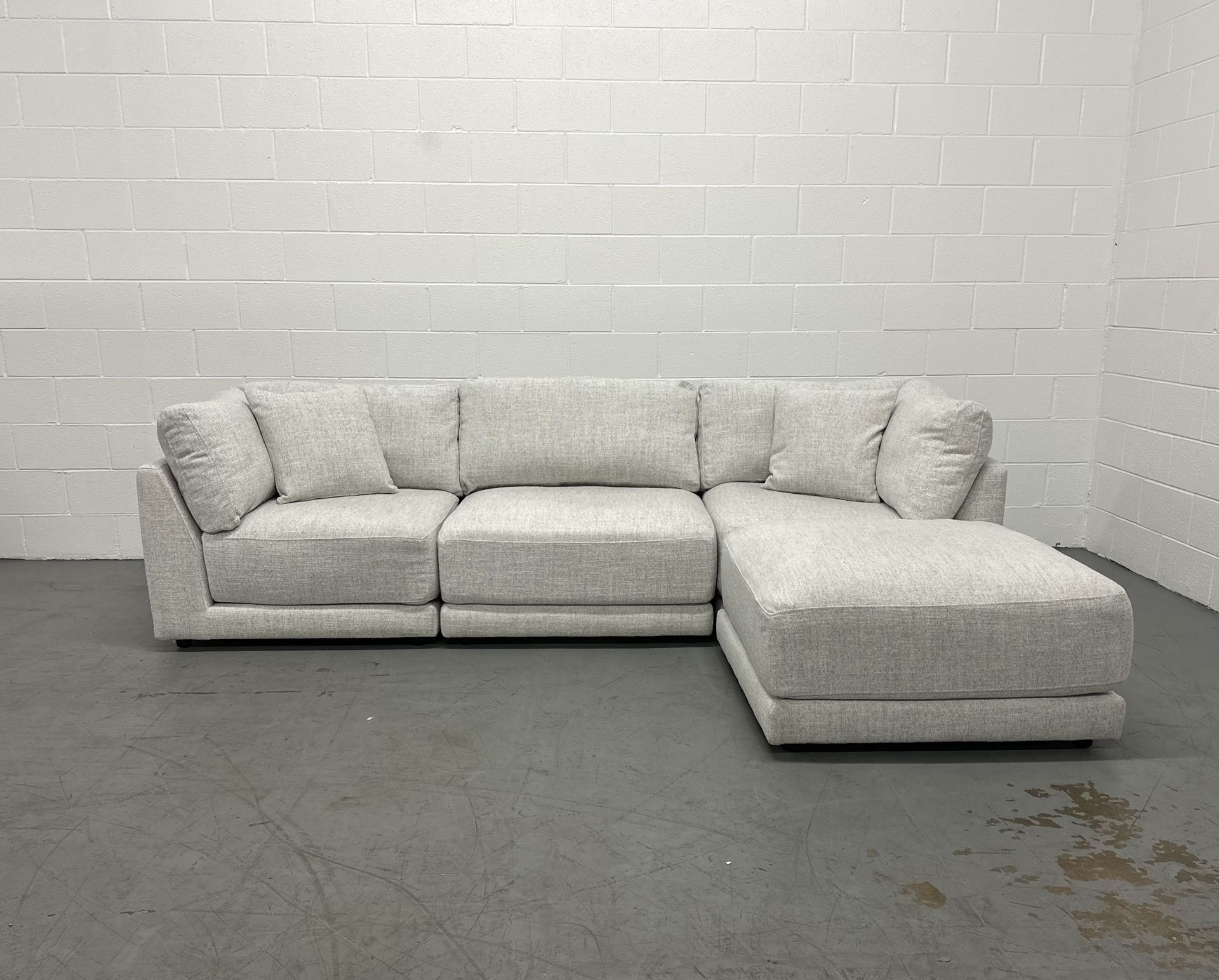 Aiden & Ivy Dayna 4-Piece Modular Fabric Sofa w/ Ottoman β Delivery Available!