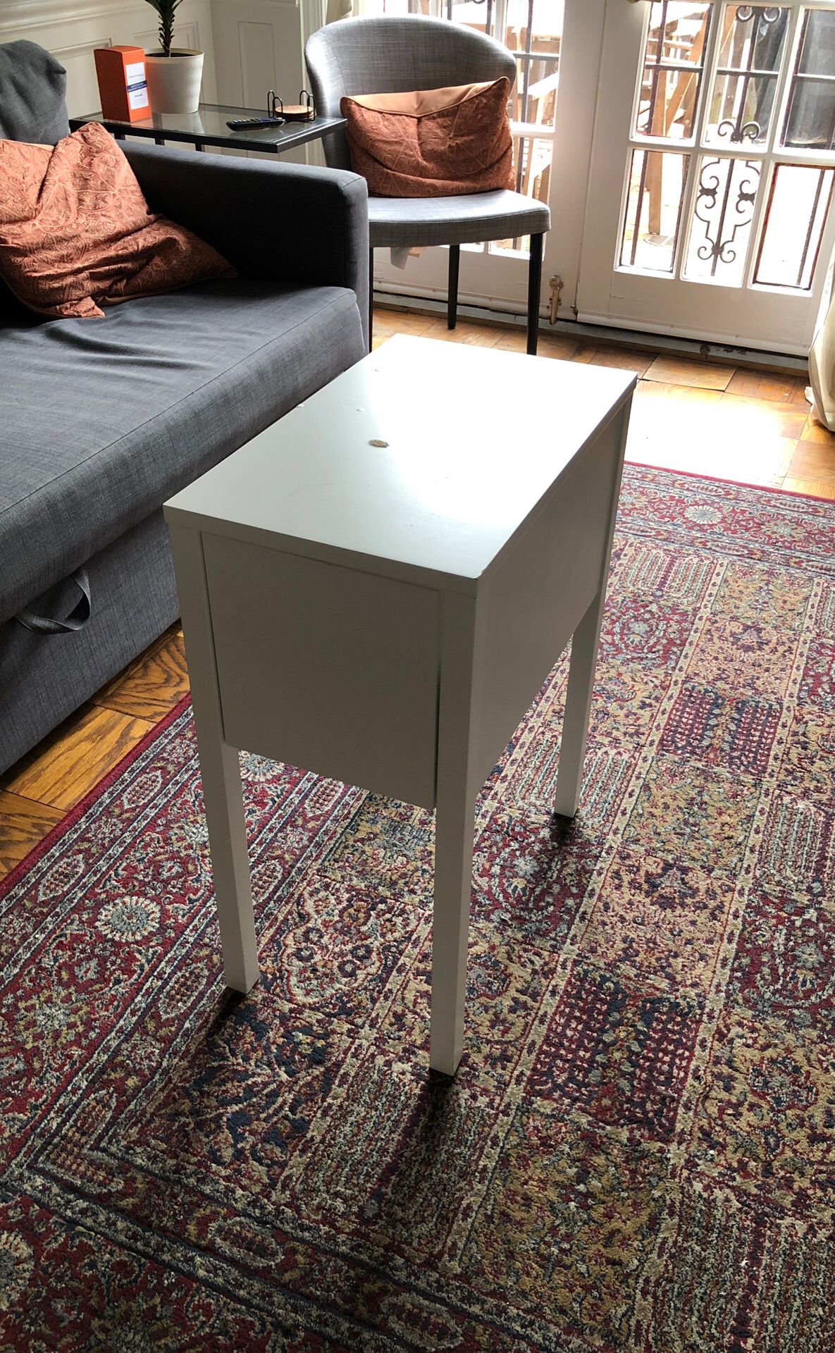 White end table with drawer