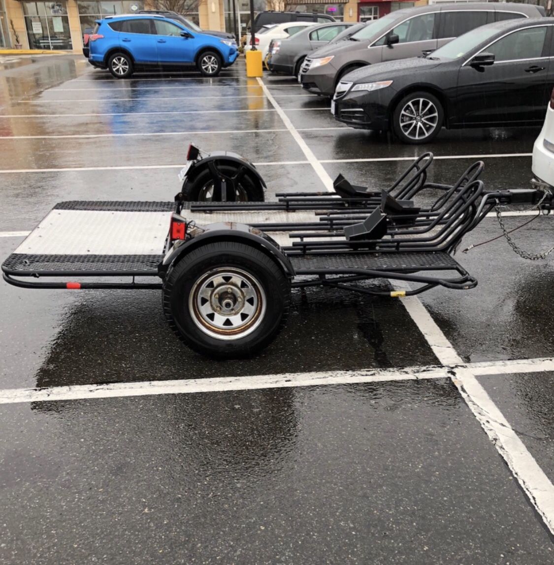 Folding motorcycle trailer