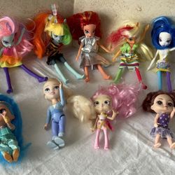Lot Of Small Handheld Dolls
