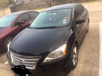 Nissan Sentra Year 2013 Miles 50300 Very good condition black color 2013 yrs..... Tile :rebuilt