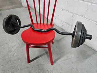 100 Pounds total. EZ Curl Bar with Cast Iron Weight Plates