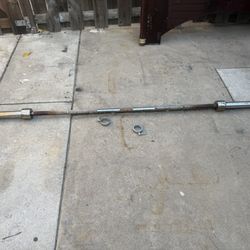 Olympic Bar With Collars. 7 Foot Long 45 Lbs 