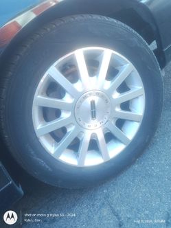 Tires and rims for a Lincoln Town car