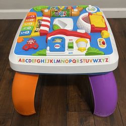 Fisher-Price Laugh & Learn Baby to Toddler Toy, Around the Town Learning Table with Music Lights & Activities