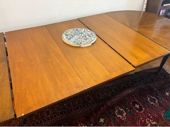 Moving out furniture sale - vintage oval extendable dining table made of solid wood.