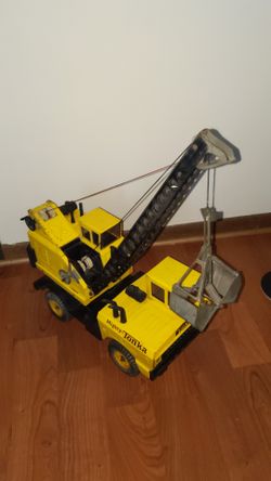 1965 Mighty Tonka pressed steel bucket loader.