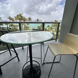 Round glass table and 2  chairs