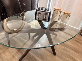Oval Glass and Wood Dining Table