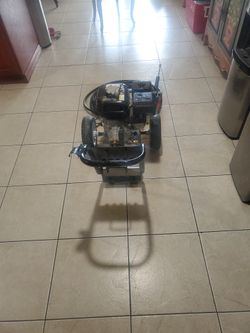 Mi T M   PRESSURE WASHER  3000. PSI  USED 