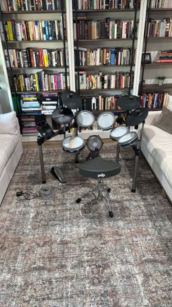 Simmons Titan 70 electronic drum kit with PDP brand stool