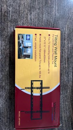 Tilting wall mount