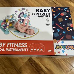 Brand New Unopened Baby Gym With Kick And Play Piano Mat 