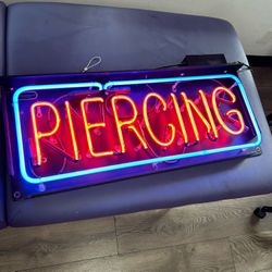 Neon “Piercing” Sign 