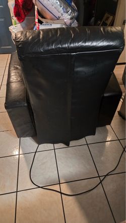 Reclining massage couch