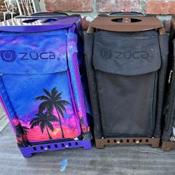 Two Zuca Rolling Backpacks