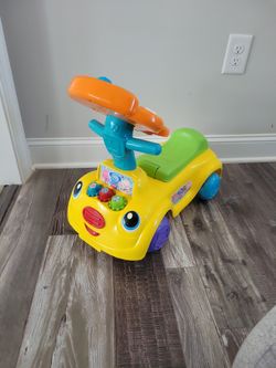 Toy Riding Musical Car (V-tech Sit To Stand Smart Cruiser)