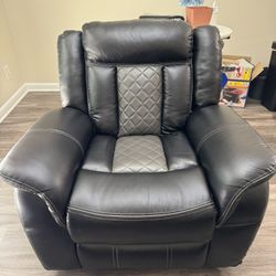 Black leather reclining armchair