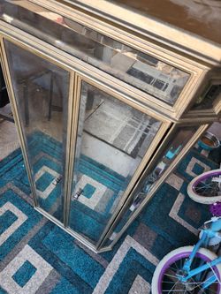 2 bathroom vanitys and one storage cabinet