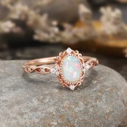 Elegant rose toned alloy ring with synthetic opal