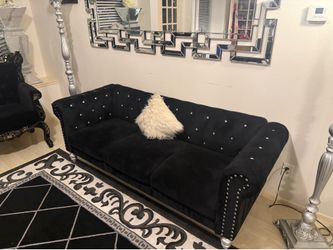 Black sofa and loveseat
