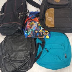 Four backpacks And One tote bag. All For $15.
