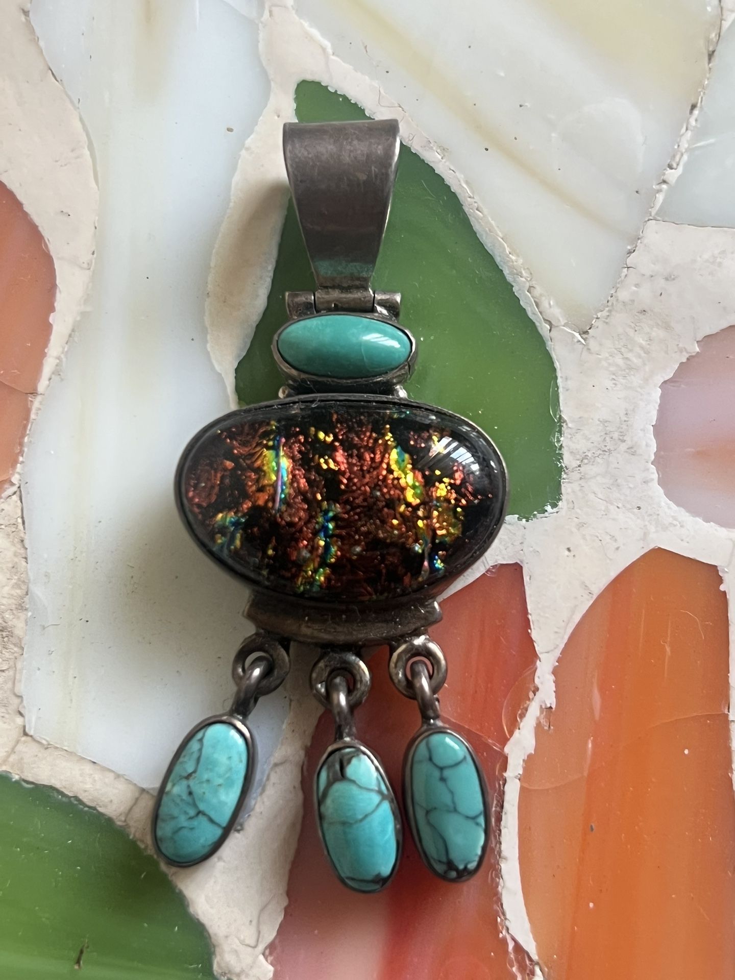 silver metal artisan southwest style pendant 