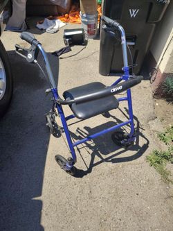 Used standup walker with seat.