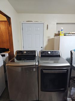 LG STAINLESS STEEL WASHER AND DRYER SET BOTH ELECTRIC XL CAPACITY 5.3 CU GOOD CONDITION HEAVY DUTY DELIVERY AVAILABLE FOR EXTRA FEE WE DO REPAIRS 
