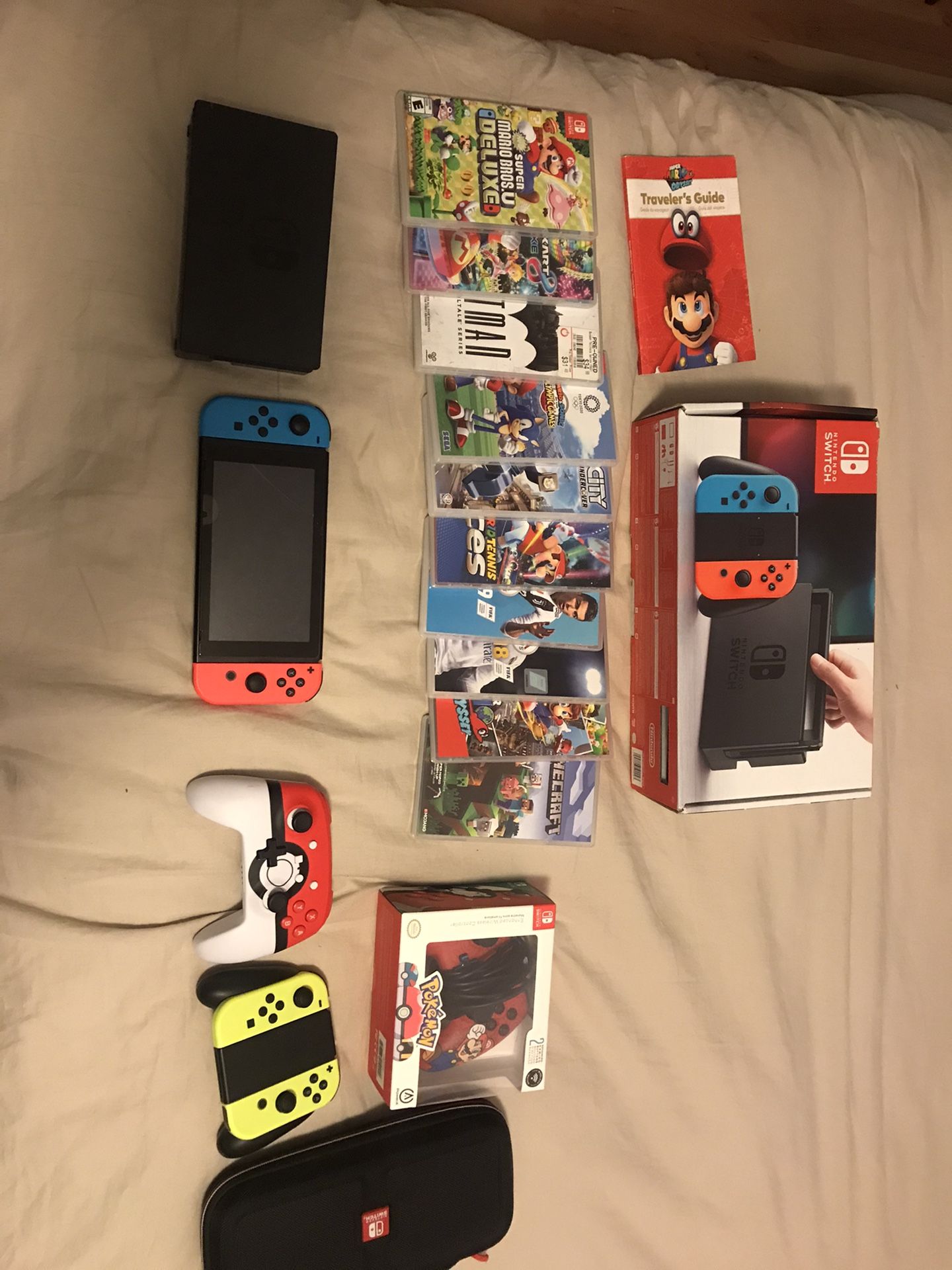 Nintendo Switch + 10 games + 3 controllers + case