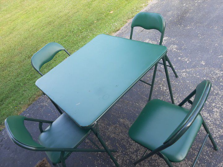 4 PADDED CHAIRS AND 1 CARD TABLE