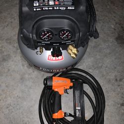 Like New Compressor Nail Gun And Hose 