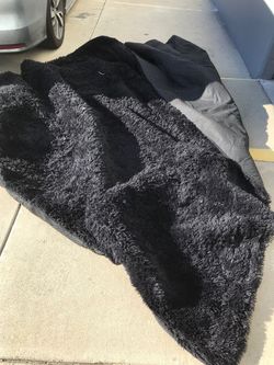 Very large black rug