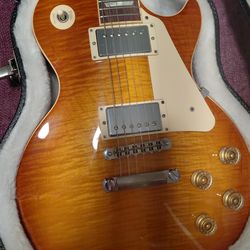 Gibson Les Paul Traditional Light Burst 2011 50s SpecsTop: Maple plus top
Neck: Mahogany, '50s rounded style
Fingerboard: Rosewood
Pickups: '57 Classi