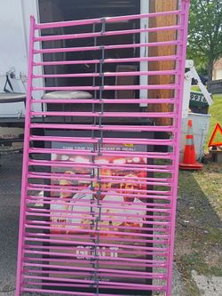 Metal frame pink bunk bed with twin size top and full size bottom