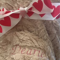Embroidery names on your throw  etc….