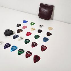 24 Assorted Guitar Picks & Cases 